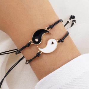 Charm armband 2 st -legering droppande olja yin yang tai chi hjärtformat par armband svart rep kedja vintage smycken gåva