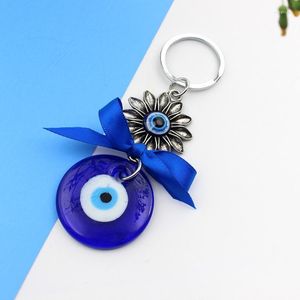 Dekorativa figurer 85AC Turkish Blue Evil Eye Keychain Bowknot Flower Key Ring Charm Ornament för bil man kvinna handväska handväska väska dekor