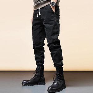 Jeans masculinos Moda de streetwear Men solto designer de retalhos de retalhos calças de carga casual macacão de estilo coreano Hip Hop Bolice