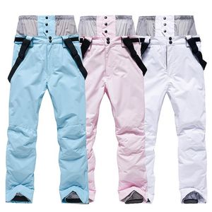 Pantaloni da sci uomo donna bianco rosa sci antivento impermeabile coppia calda pantaloni da neve snowboard invernale con protezione in vita