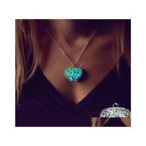 Ciondoli Moda Ciondolo a forma di cuore Luminoso bagliore nel buio Collana con medaglione per catene di maglioni da donna Fluorescente Goccia cava Consegna a casa Dhhc1