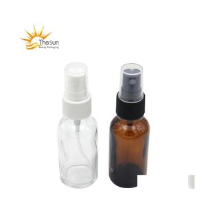 F￶rpackningsflaskor 15 ml 30 ml Amber Glass Spray Bottle Wholesale eterisk olja per med svart eller vit m￶ssa Drop Delivery Office School B DHTWM