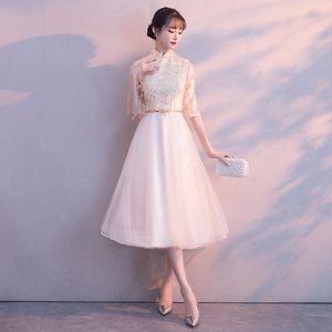 エスニック服のシャンパンエレガントな中国のイブニングパーティードレス女性の羽をトリムトリム絶妙な宴会ガウンロングノベルティAラインドレス