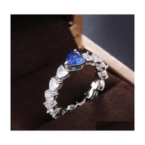 Fedi nuziali Elegante anello a fascia da donna con zirconi a cuore blu Squisito gioielli in cristallo pieno di gioielli alla moda Fidanzamento femminile 3557 Q2 Drop Del Dhnb0