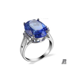 مع الحجارة الجانبية 10 قطع Luckyshine Oval Swiss Blue Tapaz Gems Crystal Cubic Zirconia Rings 925 Sterling Sier Women Engagemets Hol DHV5N