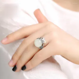 Klusterringar naturliga Hetian Yutai Silver Money Bag Creative Hollow Craft Opening Justerbar ring Kinesisk retro Charm Kvinnsmycken