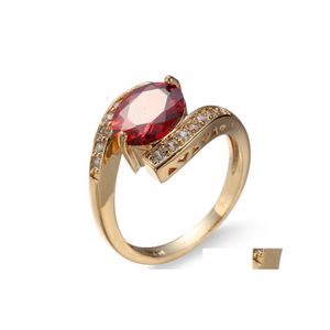 Med sidogonter 10 stycken 1 Lot Luckyshine Fire Oval Garnet Gold Plated For Womens Red Zircon Rings Jewelry Holiday Gift Drop Delive DHBW6