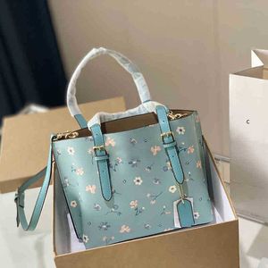 Nya blommor tryckta shoppingväskor totes CBAG Womens Designer Bag Luxurys handväska mode tygväska läder axel crossbody handväska kvinnor strandpåse 220727