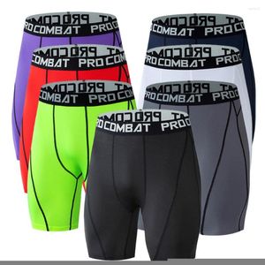 Shorts de corrida Calças esportivas de fitness Meia-calça de treino de basquete masculina Calça de compressão para academia