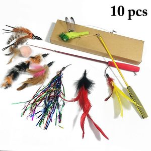 猫のおもちゃ10pcs/lot feather wand wand kitten teaser turkeyインタラクティブスティックトイワイヤーチェーザー交換