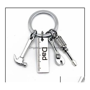 Nyckelringar smycken Mini Handverktyg Kedjor Ring Skiftnyckel Skruvmejsel Hammer Keychain Charm Holder Rostfritt stål Keyring för Father Day Dhoub