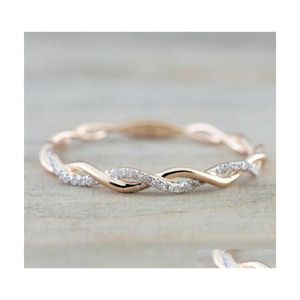 Bröllopsringar Rose Gold Color Zircon Twist Geometric Ring Fashion Lady Luxury Party Gift Delivery Jewelry DH2UB