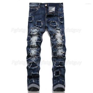 Jeans da uomo blu scuro con foro per rivetti moda slim patch elasticizzata piccoli pantaloni in denim dritti primavera autunno stile punk streetwear