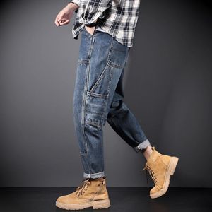 Мужские джинсы плюс размер мужские мужчины растягивали джинсовые брюки.