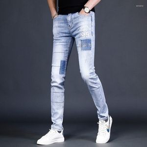 Męskie dżinsy Summer 2023 Fashion Blue Men Slim Fit Pants Letterstones Drukowane dżinsowe streetwearne dżinsowe spodnie