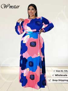 Plus Size Kleider Wmstar Größe für Frauen Lose Langarm Blumendruck Großer Saum Elegantes Maxikleid Herbstkleidung Großhandel Drop 230130