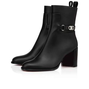 This ankle boot has a 70mm heel design. It is made of black calfskin with silver buckles and iconic silver studs on the side