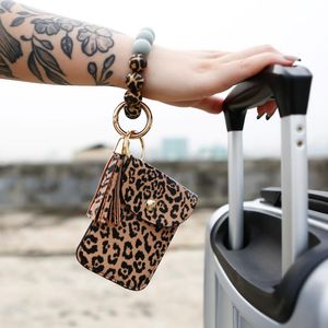 Keychains Fashion Silicone Bead Wrist Keychain For Women Men Card Bag PU Leather Leopard Car Key Chain Pendant Year Gifts 2023Keychains