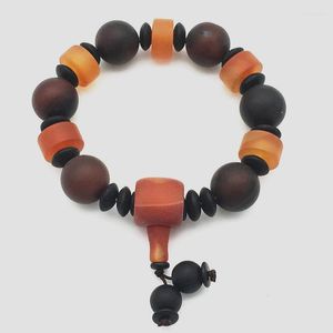 Strand fashionabla joker 14mm naturlig oregelbunden svart och röd noxy sten pärla armband 2 st 001 bungee cord män kvinnor