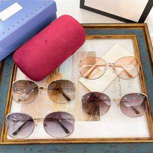 2023 luxury designer sunglasses New G Family Round Frame Fashion Sunglasses Female Star Net Red ins Sun Glasses Male GG0650