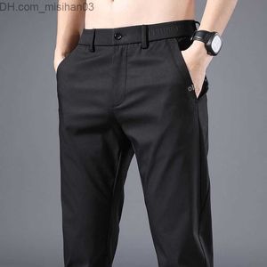 Pantaloni da uomo Pantaloni da uomo casual da uomo d'affari Primavera estate nuovo ufficio sociale abiti da strada moda uomo sottile Pantaloni dritti kaki 5XL Z230801