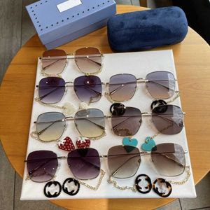 2023 luxury designer sunglasses New G Family Women's Love Earrings Chain Fashion Versatile Metal Frame Sunglasses 1031 UV Resistant