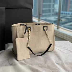 Designer Channel Beach Tote Bag Canvas Cowhide broderi handväska 10a klassisk handgjorda kvalitetsresor shopping väskor mode lyx hög kapacitet denim läder