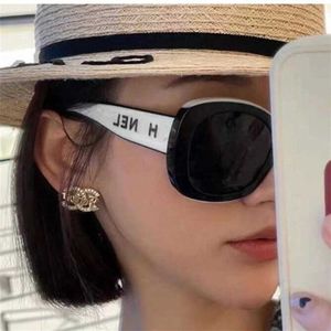 2024 New luxury designer CH9091 Hepburn style white oval sunglasses Same letter glasses leg Sunglasses