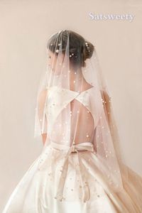 Veli da sposa Donna elegante Perle Lunghezza punta delle dita Con pettine Velo avorio / bianco per matrimonio in tulle con bordo tagliato