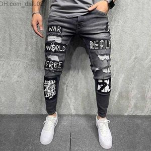 Jeans da uomo Jeans da uomo Pantaloni da uomo Slim Fit Moda Casual Quattro stagioni Patchwork elastico Lettera Strappato Streetwear Moto Denim Z230801