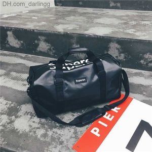 Outdoor Bags Duffle Bags New Portable Letter Business Travel Bag Pu Men s and Women s Sports Fitness Short Distance Light Storage Luggage 230406 Z230801