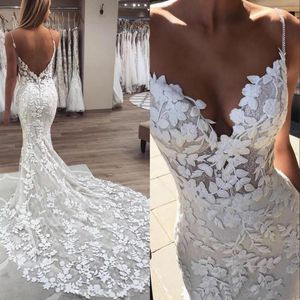 Perline Perle Cinturino per spaghetti Abiti da sposa a sirena in pizzo 2021 Splendide applicazioni floreali 3D Boho Abiti da sposa Schienale basso Robe De Mar2464