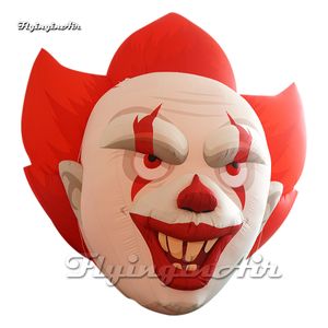 Fantastiskt ondt leende uppblåsbart clownhuvud ballong hängande jester figur modell rött hår för halloween karneval dekoration