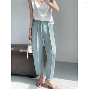 Pantaloni da donna pieghettati con cucitura centrale elastica, gamba piccola stirata con tasca in vita e taglio casual allentato per le donne