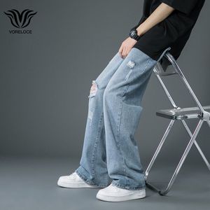 Jeans da uomo Lo stile primaverile ed estivo è Jeans strappati sottili Pantaloni di jeans larghi alla moda di strada coreana Pantaloni casual blu larghi 230802