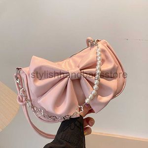 Omuz çantaları kadınlar için bowknot çanta 2023 Moda yeni inci zinciri messenger çanta moda tasarımı batı tarzı doku omuz bagstylishhandbagsstore