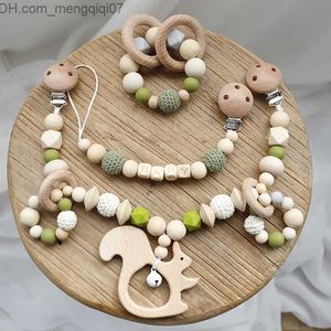 PACIFIER HOLDER CLIPS# Baby Toys Silicone Beads Teeth Wood Rings Handgjorda armband Nippelkedjor Tandklämmor Vagnar Bell Baby Products Z230804