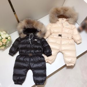 Jaquetas de inverno de marca 2023 Casacos de bebê de inverno Macacão de bebê Jaquetas de enchimento de penas de ganso branco Designer bebês moda Casacos de inverno Gola de pele grande tamanho 90-110 cm