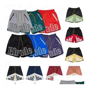 Shorts Masculino Rhude Gráfico Mens Basketball Short Designers Últimas Calças Limitadas Luxos Verão Praia Palm Letra Malha Moda Rua Dhgga