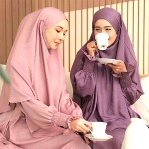 Kvinnors kläder Mellanöstern Turkiet Arabisk fast färg långärmad stor flänsad klänning