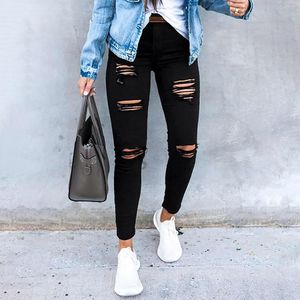 Женские джинсы черные эластичные высокие тали