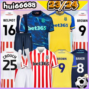 23/24 Stoke City maglie da calcio HOME AWAY CLUCAS MIKEL FLETCHER SMITH POWELL BROWN WILMOT GAYLE JAGIELKA WILMOT POWELL LAURENT 2023 2024 Uomo Bambini Kit magliette da calcio