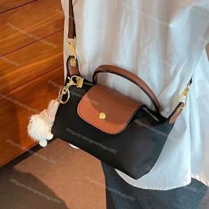 Bag Quality Store 90% rabatt på grossistplånbok Handväska Hög Luxury Crossbody-version Mini Dumplings 2024 Single-handtag Läder Luxurys handväskor