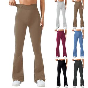 Kobiety płomieniowe legginsy Solidny kolor w kształcie litery V Wysokiepliste spodnie moda płynna szczupła sportowa joga ubranie