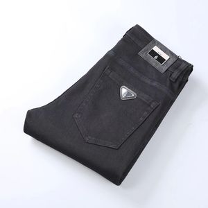 Designer mens jeans elasticitet jean hombre byxor män och kvinnor modemärke lyxbyxor denim byxa trend varumärke motorcykel byxor mens mager logotyp knappar 29-40