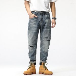 Мужские джинсы в стиле мужчины летние голубые разорванные расслабленные слабые прямые прямые хлопчатобумажные брюки.