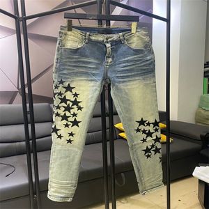 Jeans masculino Patches esfarrapados femininos são calças de marcas de moda Calças soltas de moda feminina 1Z2X12104