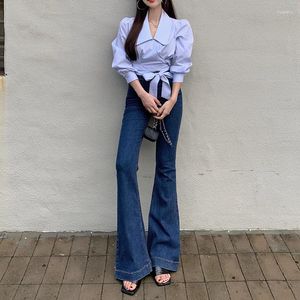 Kvinnors jeans blossade för kvinnor 2023 retro hög midja casual byxor tight denim street mode hip lift klockbotten