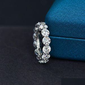 Pierścienie Eternity 5 mm moissanite Pierścień 100% Oryginał 925 Sterling Sier Party Band for Women Drobne zaręczyny Dostawa DHXBV