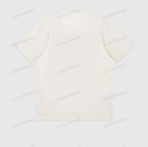 2023 Mężczyźni Plus Designer T-koszulki Drukuj z krótkim rękawem Załoga Szyjka Streetwear Black White Xinxinbuy M-3xl